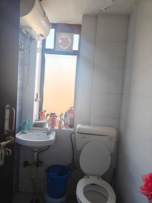 Bathroom in 1 RK Apartment at Mahindra Aura, Sector 110a – for Rent