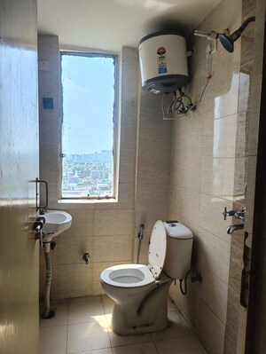 Bathroom in 1 RK Apartment at Mahindra Aura, Sector 110a – for Rent