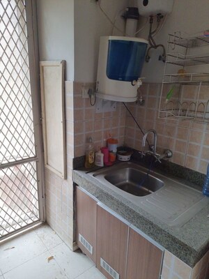 Kitchen in 3 BHK Apartment at Mahindra Aura, Sector 110a – for Rent