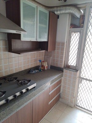 Kitchen in 3 BHK Apartment at Mahindra Aura, Sector 110a – for Rent