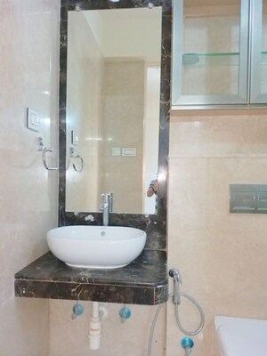 Bathroom in 3 BHK Apartment at Kalpataru Sparkle, Bandra East – for Rent
