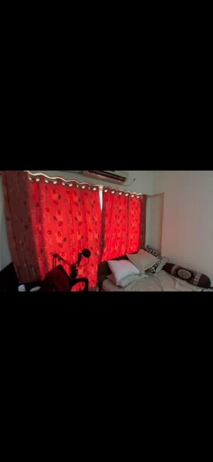 Bedroom in 1 BHK Apartment at Ruparel Elara, Kandivali West – for Rent