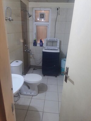 Bathroom in 3 BHK Apartment at Mahindra Aura, Sector 110a – for Rent