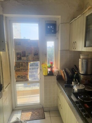 Kitchen in 3 BHK Apartment at Mahindra Aura, Sector 110a – for Rent