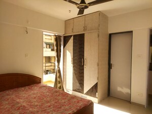 Bedroom in 2 BHK Apartment at Palladium Homes, Dhanori – for Rent