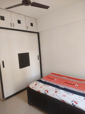 Bedroom in 2 BHK Apartment at Palladium Homes, Dhanori – for Rent