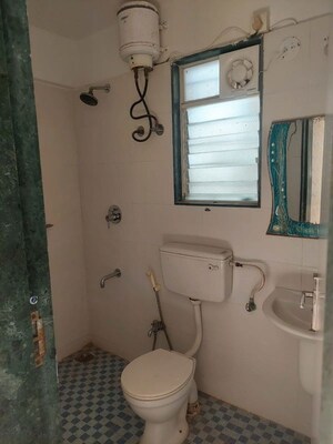 Bathroom in 2 BHK Apartment at Palladium Homes, Dhanori – for Rent