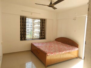 Bedroom in 2 BHK Apartment at Palladium Homes, Dhanori – for Rent