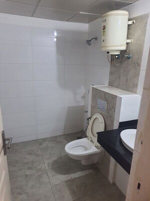 Bathroom in 3 BHK Apartment at Mahindra Aura, Sector 110a – for Rent