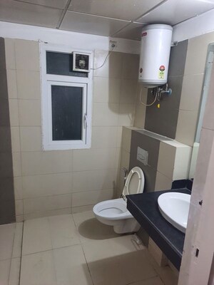 Bathroom in 3 BHK Apartment at Mahindra Aura, Sector 110a – for Rent