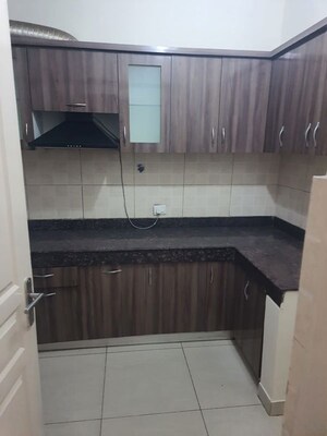 Kitchen in 3 BHK Apartment at Mahindra Aura, Sector 110a – for Rent