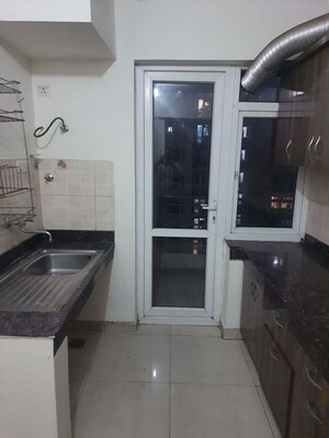 Kitchen in 3 BHK Apartment at Mahindra Aura, Sector 110a – for Rent