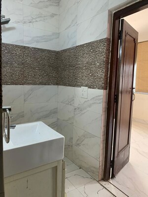 Bathroom in 3 BHK Apartment at Malviya Nagar – for Sale