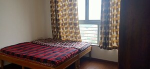 Bedroom in 2 BHK Apartment at Majestique Towers, Kharadi – for Rent