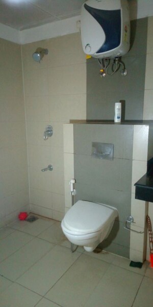 Bathroom in 4 BHK Apartment at Mahindra Aura, Sector 110a – for Rent