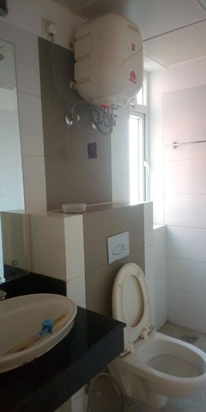 Bathroom in 4 BHK Apartment at Mahindra Aura, Sector 110a – for Rent