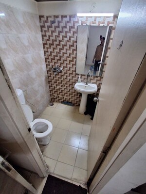 Bathroom in 2 BHK Apartment at Mahagun My Woods, Sector 16c Greater Noida – for Rent