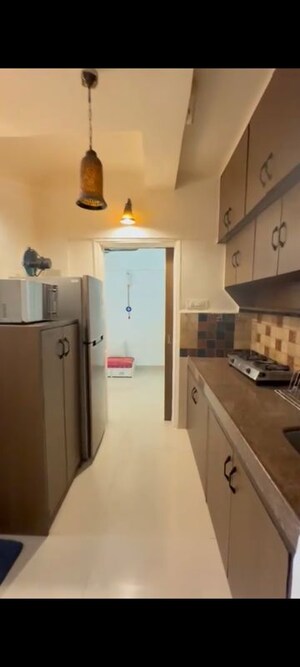 Kitchen in 1 BHK Apartment at Link Garden, Andheri West – for Rent