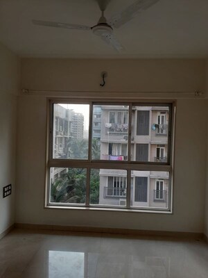 Room in 2 BHK Apartment at Chaitanya Kohinoor, Kandivali East – for Sale