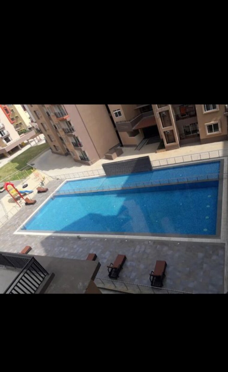 Swimming Pool, sjr-fiesta-homes 2 Bedroom 1240 Sq.Ft. Apartment In Electronic City Phase ii Bangalore 10255683