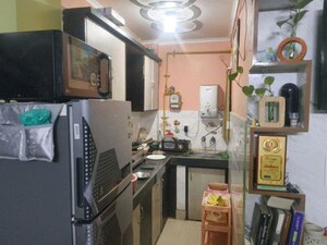 Kitchen in 2 BHK Apartment at Kailash Puram, Sadarpur – for Sale