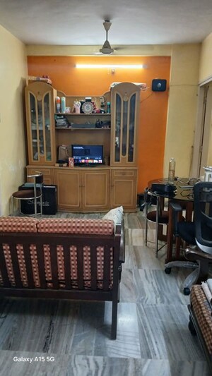 Living Room in 1.5 BHK Apartment at Raheja Township, Malad East – for Rent