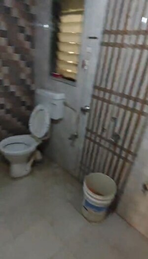 Bathroom in 2 BHK Apartment at Sadguru Heritage, Badlapur West – for Rent