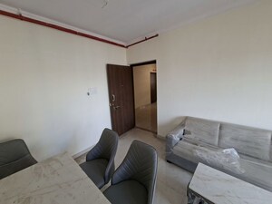 Living Room in 1 BHK Apartment at KIPL Morya, Kasarvadavali – for Rent