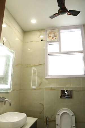 Bathroom in 4 BHK Builder Floor at New Friends Colony – for Rent