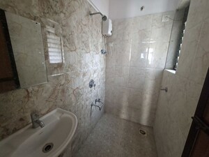 Bathroom in 1 BHK Apartment at Raunak Heights, Ghodbunder Road – for Rent