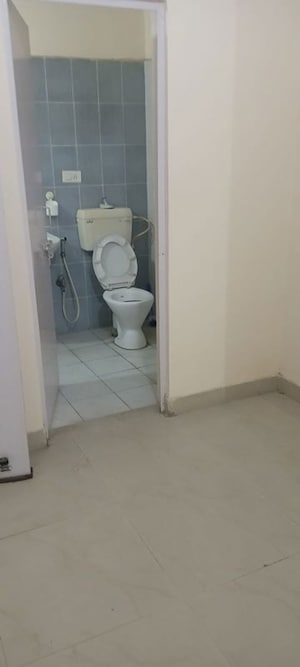 Bathroom in 4 BHK Apartment at Gomti Nagar – for Sale
