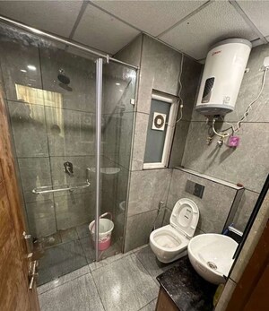 Bathroom in 3 BHK Apartment at Govind Vihar – for Rent