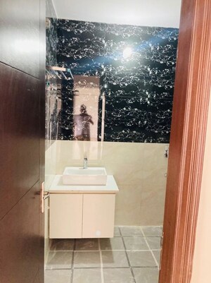 Bathroom in 3 BHK Builder Floor at AWHO Apartments, Sector 22 – for Rent