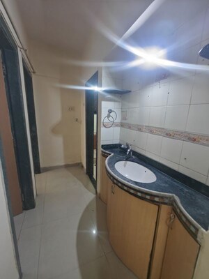 Bathroom in 2 BHK Apartment at Seawoods Sector 46 – for Rent