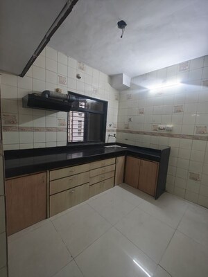 Kitchen in 2 BHK Apartment at Seawoods Sector 46 – for Rent