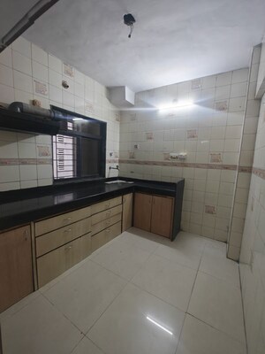 Kitchen in 2 BHK Apartment at Seawoods Sector 46 – for Rent
