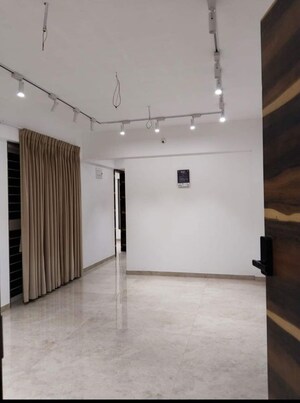 Building Lobby in 2 BHK Apartment at SS Rutuparna, Moshi – for Rent