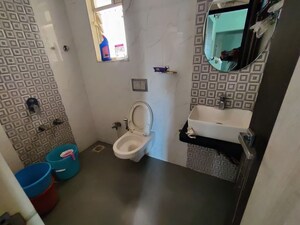 Bathroom in 1 BHK Apartment at Mahavir Kalpavruksha, Ghodbunder Road – for Sale