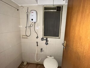 Bathroom in 1 BHK Apartment at Marathon Cosmos, Mulund West – for Sale