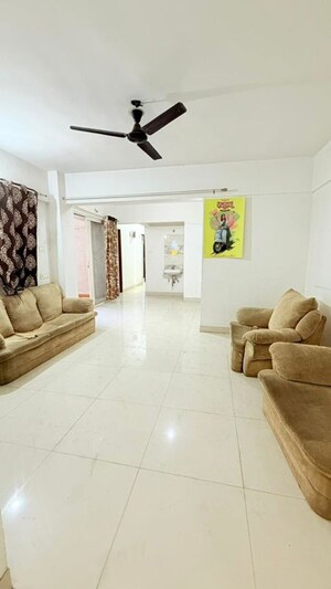 Living Room in 2.5 BHK Apartment at Abhinav Pebbles Urbania, Bavdhan – for Sale