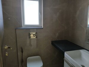 Bathroom in 3 BHK Apartment at Smart World Orchard, Sector 61 – for Rent