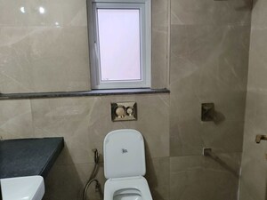 Bathroom in 3 BHK Apartment at Smart World Orchard, Sector 61 – for Rent