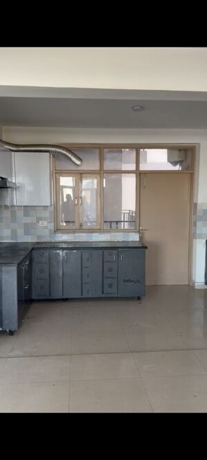 Kitchen in 4 BHK Apartment at Pareena Express Heights, Sector 99 – for Rent