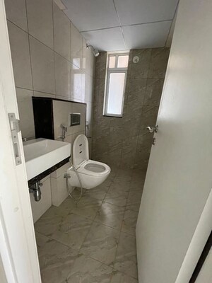 Bathroom in 2 BHK Apartment at Godrej Green Vistas, Mahalunge – for Rent
