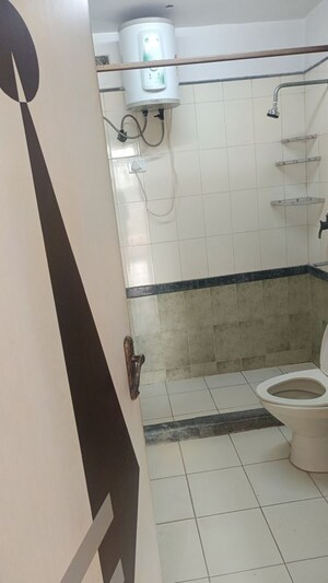 Bathroom in 3 BHK Apartment at ATS Green Village, Sector 93a – for Rent