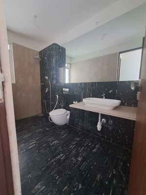 Bathroom in 3 BHK Apartment at Omkar Alta Monte, Malad East – for Rent