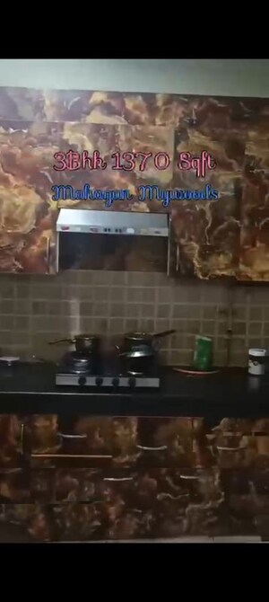 Kitchen in  Apartment at Mahagun My Woods, Sector 16c Greater Noida – for Sale