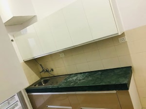 Kitchen in 2 BHK Apartment at Ansal Paradise Crystal, Sushant Golf City – for Rent