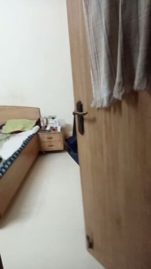 Bedroom in 2 BHK Apartment at Akurli Shivshakti Chs, Lokhandwala – for Rent