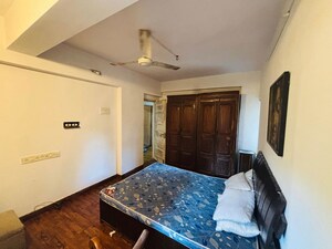 Bedroom in 2 BHK Apartment at Andheri CHS, Andheri West – for Rent